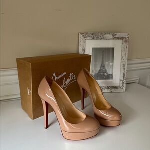 Italian designer shoes, Christian Louboutin  with heel and platform